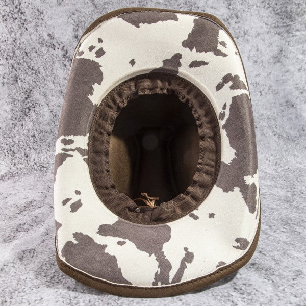 Cow print under brim cowboy
